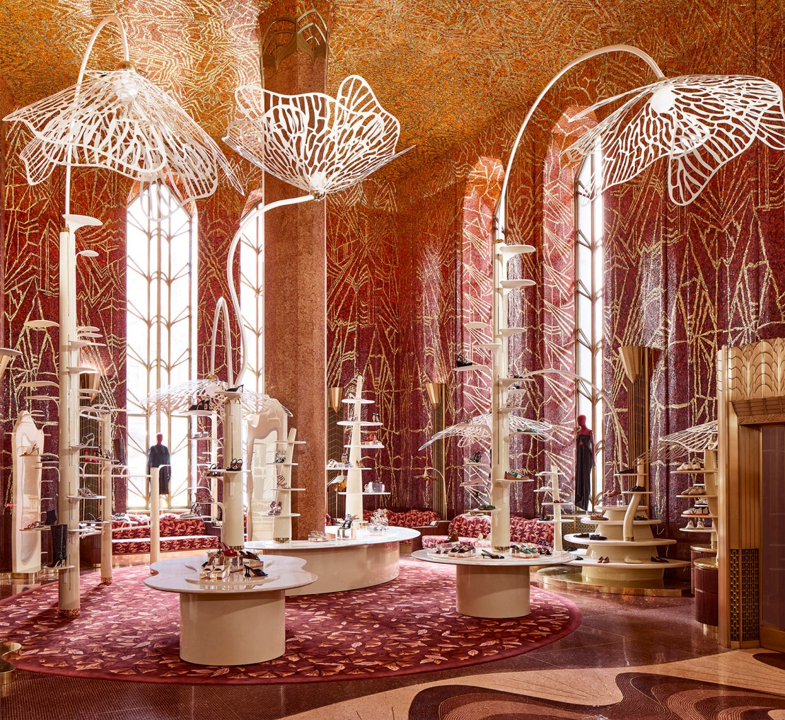 The Red Room at the department store Printemps New York, with mosaics and tall flower sculptures