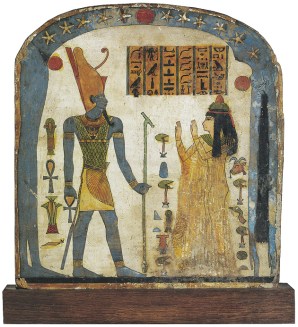 Funerary stela of Lady Taperet, Third Intermediate Period, circa 850–690 BCE. Lady Taperet is praying to Atum, god of the setting sun, in the hope of eternally accompanying him on his daily journey. The hieroglyphs above her exhort the god to grant her everything she will need in the afterlife. The sky is represented by the blue body of the goddess Nut, who swallows the sun every night and gives birth to it every morning.
