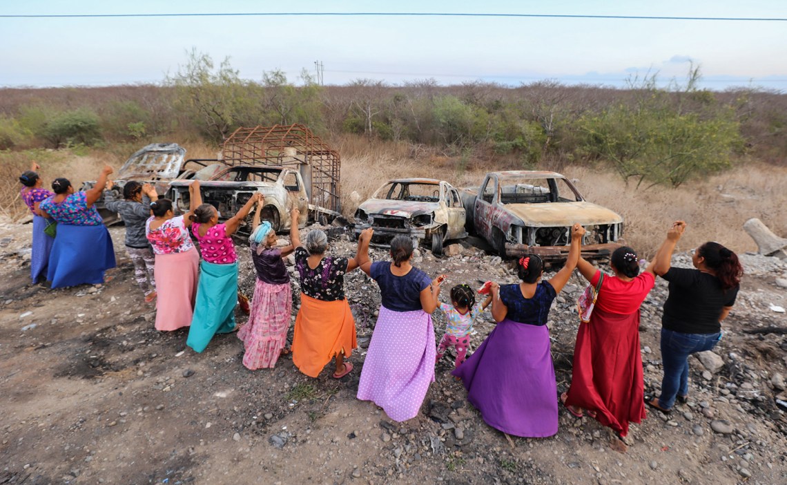 Indigenous Binnizá women celebrating the destruction of several vehicles that entered their communally owned forest, El Pitayal