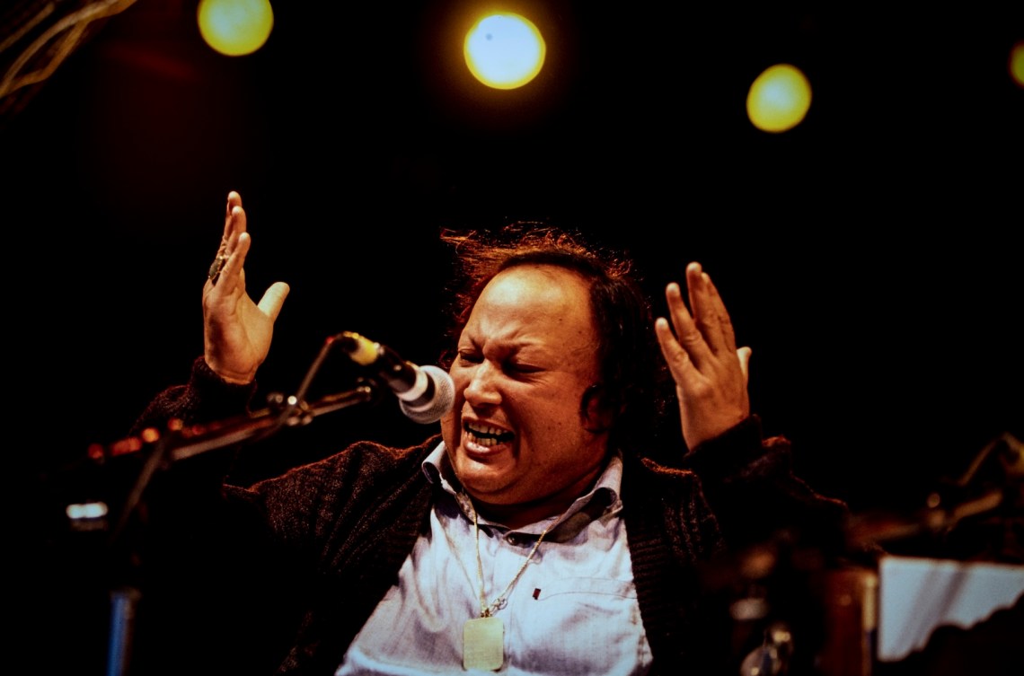 Nusrat Fateh Ali Khan performing at the World of Music, Arts and Dance (WOMAD) festival